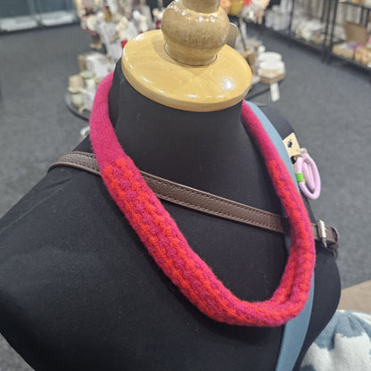 Handmade Scottish lambswool knitted necklace in soft looped design, shown on mannequin highlighting texture and craftsmanship.