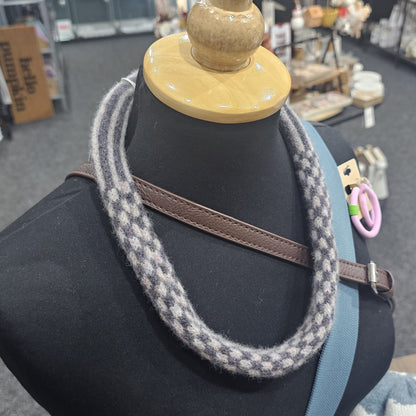Handmade Scottish lambswool knitted necklace in soft looped design, shown on mannequin highlighting texture and craftsmanship.