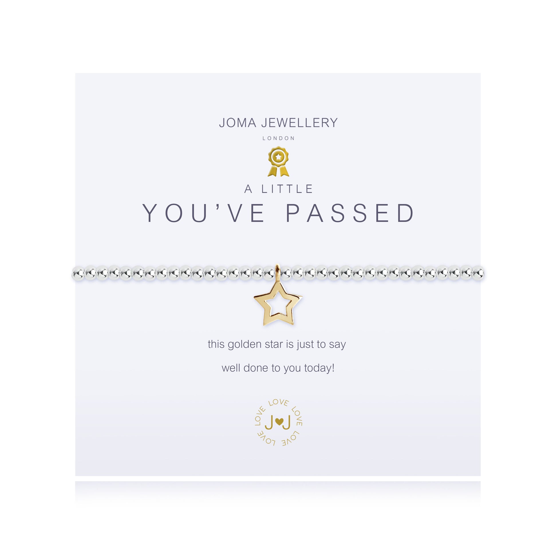 A silver bracelet with a gold-plated star charm, presented on a card that reads 'JOMA JEWELLERY A LITTLE YOU'VE PASSED', indicating a celebration of an achievement.
