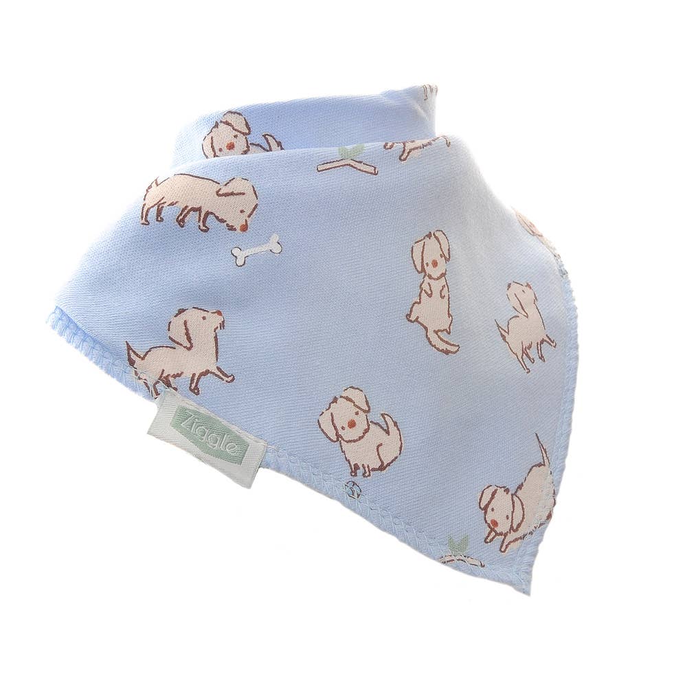 Baby bib with dog pattern on a light blue background