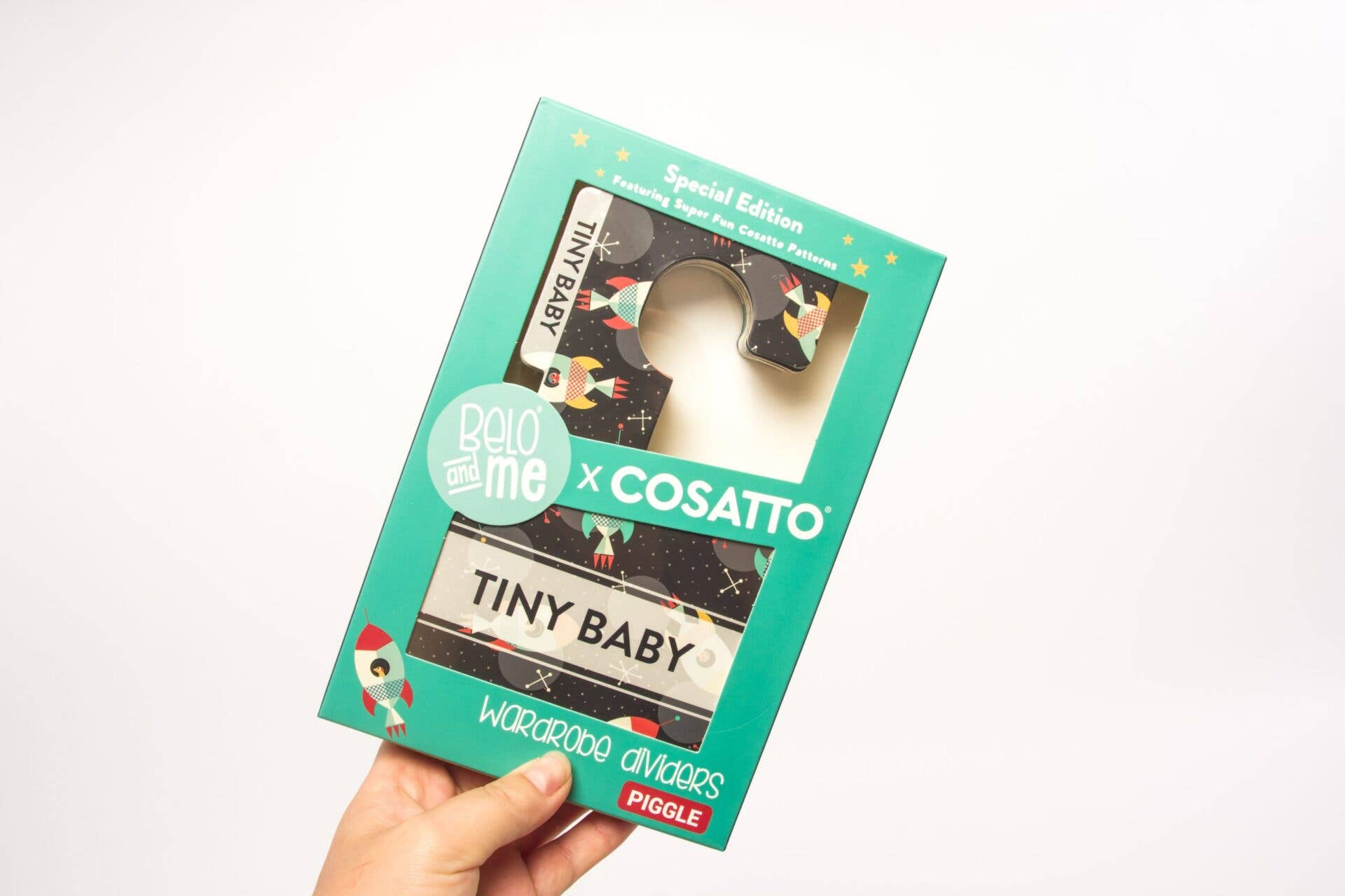 Box of 16 wardrobe dividers featuring bright, fun Cosatto patterns like foxes, dinosaurs, and aliens, labelled with baby sizes.