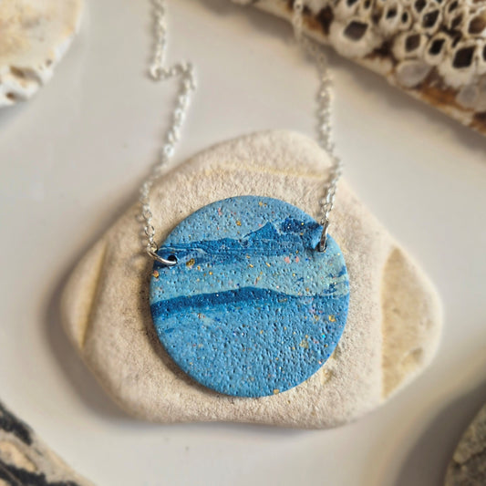 Large handmade blue polymer clay pendant on 18-inch silver chain by Sefara Jewellery. Nautical design.