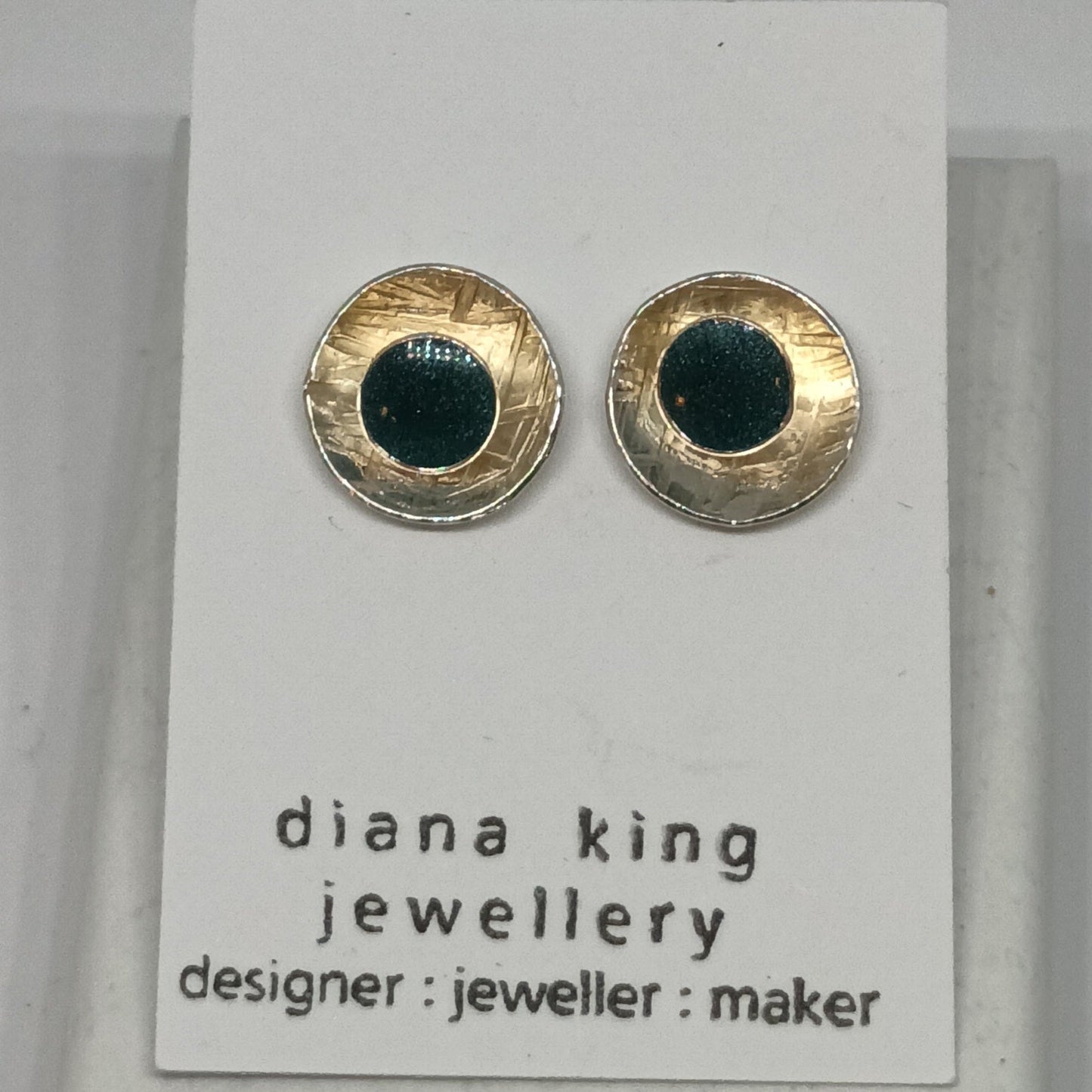 Sterling silver 2-in-1 green enamel stud earrings with removable domed backs, handmade in Scotland