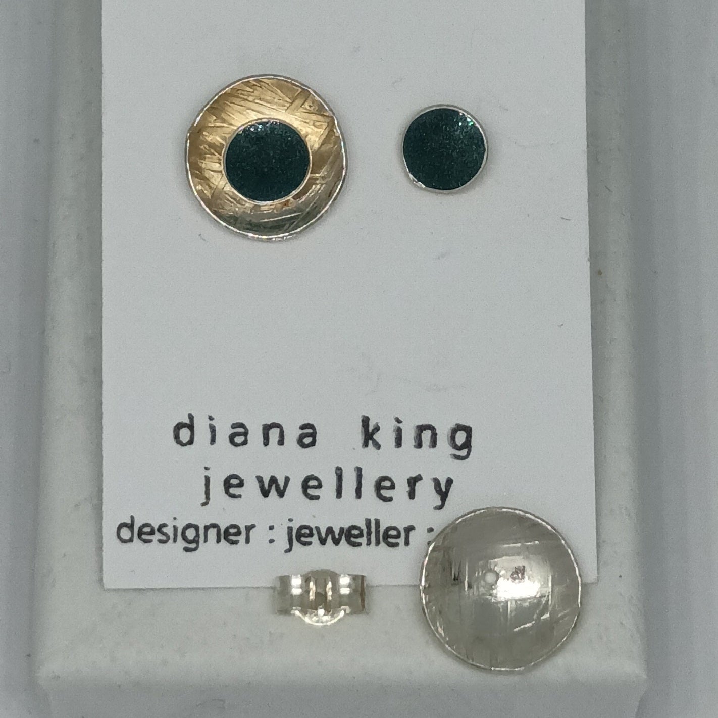 Sterling silver 2-in-1 green enamel stud earrings with removable domed backs, handmade in Scotland