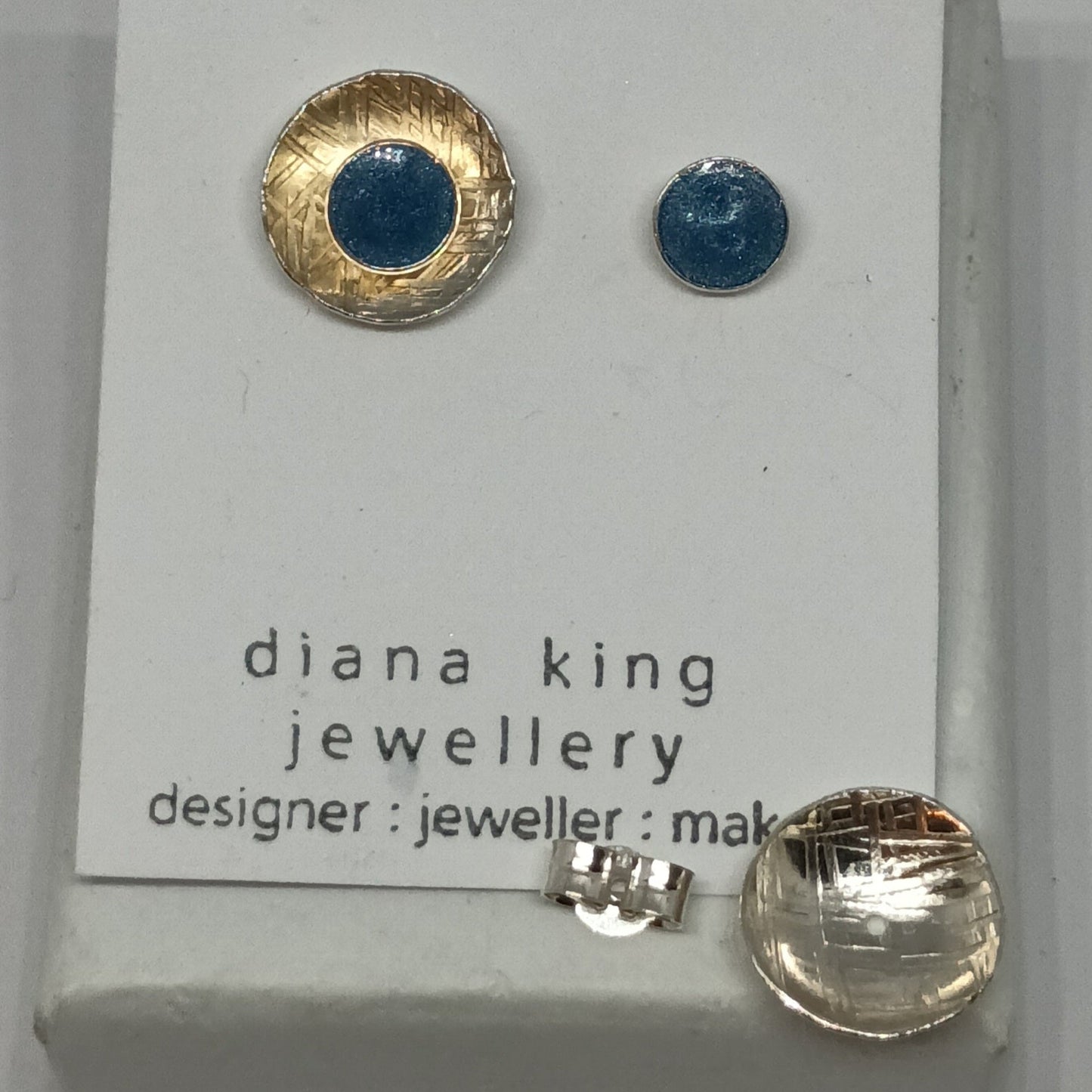 Sterling silver 2-in-1 blue enamel stud earrings with removable domed backs, handmade in Scotland