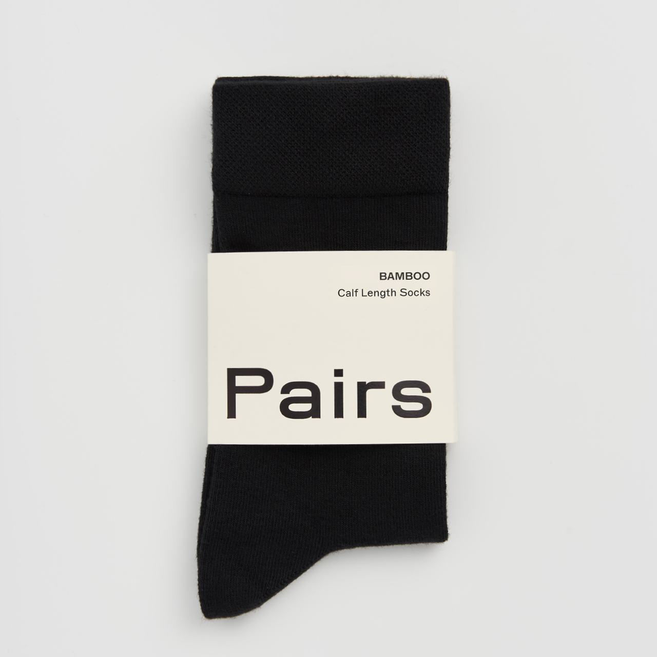 PAIRS Scotland Bamboo socks in True Black highlighting their soft texture.