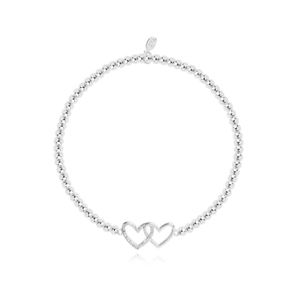 A LITTLE 'HAPPY ANNIVERSARY' SILVER BRACELET