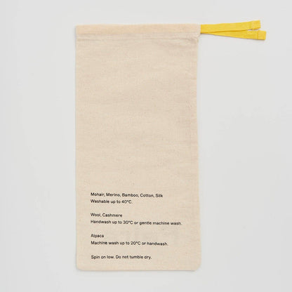 PAIRS Cream cotton dustbag with yellow drawstring  and printed washing instructions