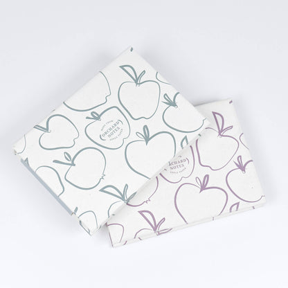 Recycled sticky notes pad in green or pink with Orchard Notes debossed cover and three sizes of biodegradable sticky notes