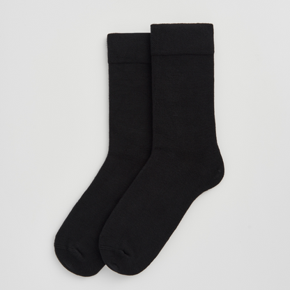 PAIRS Scotland Bamboo socks in True Black highlighting their soft texture.