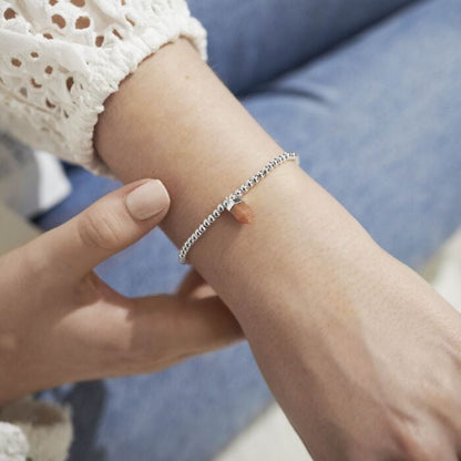 'Empowerment’ bracelet with affirmation sunstone charm. Silver-plated, stretch fit, and gift boxed