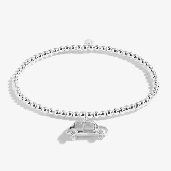 Silver-plated stretch beaded bracelet with car shaped charm