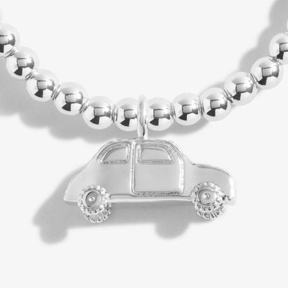 Silver-plated stretch beaded bracelet with car shaped charm