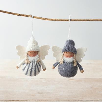 A set of two charming knitted fabric angel decorations, each with white wings and a woolly hat.