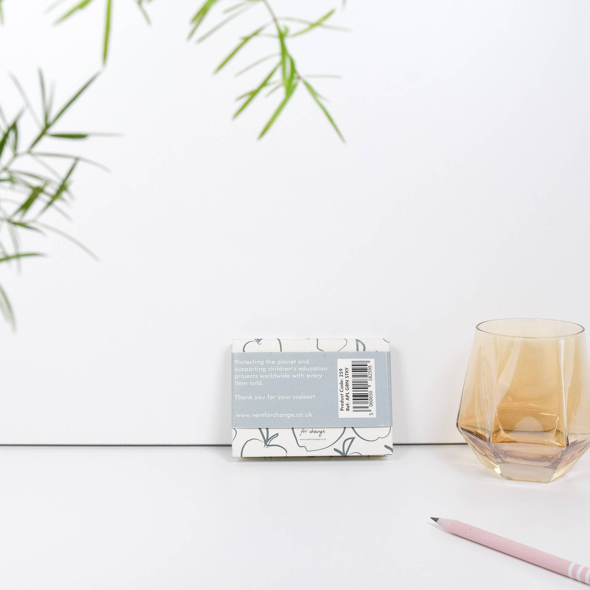 Recycled sticky notes pad in green with Orchard Notes debossed cover and three sizes of biodegradable sticky notes