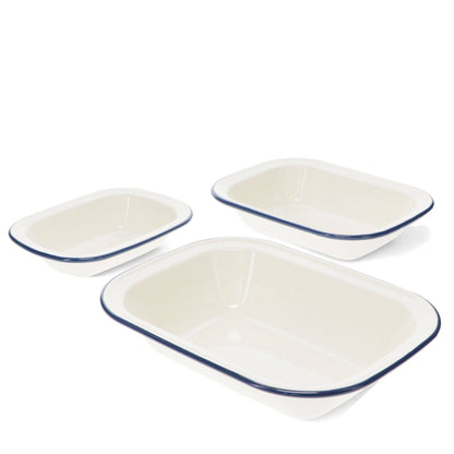 Set of three white enamel pie dishes with blue rim in assorted sizes