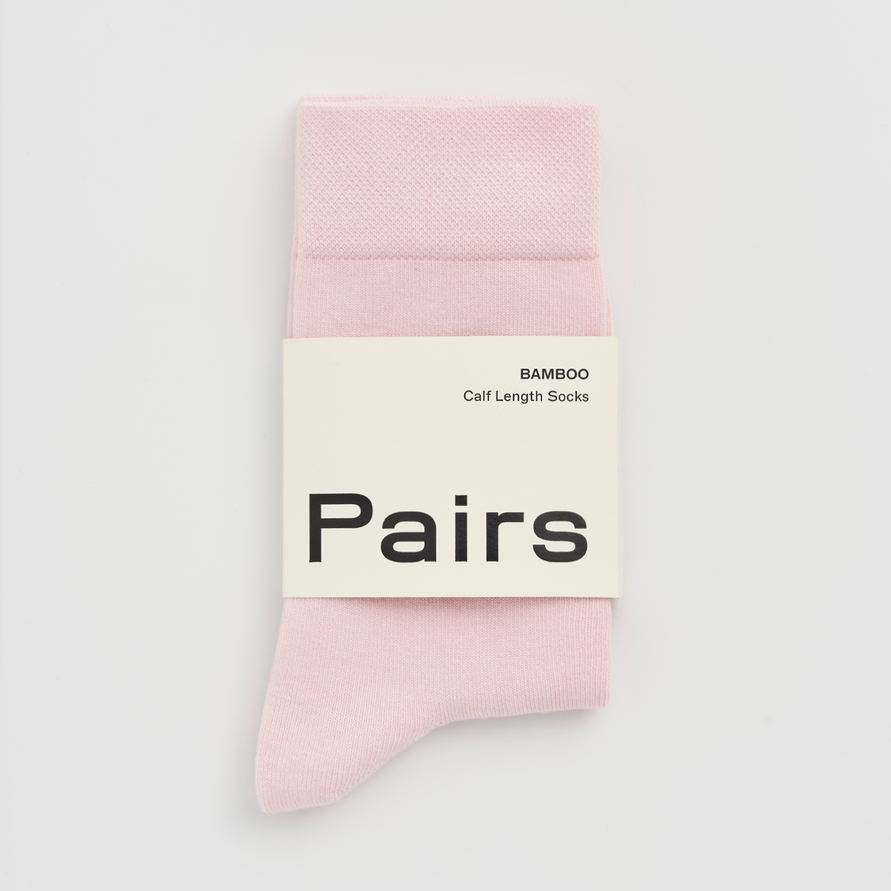 PAIRS Scotland Bamboo socks in Marshmallow Pink highlighting their soft texture.