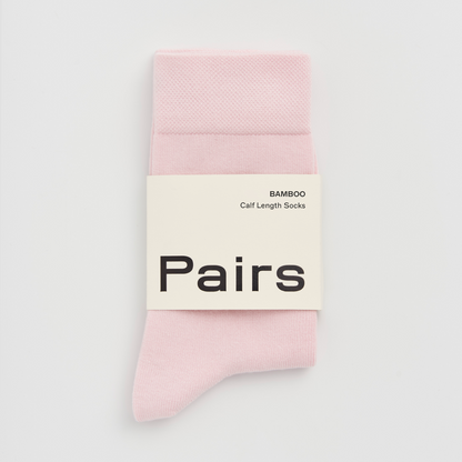 PAIRS Scotland Bamboo socks in Marshmallow Pink highlighting their soft texture.