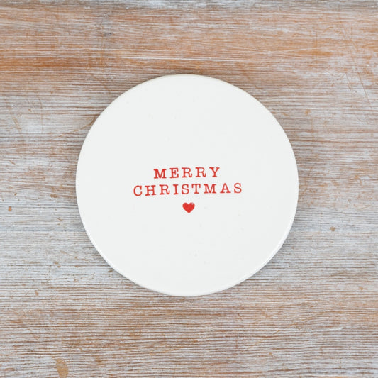 Simple white ceramic Christmas coaster, each with a different festive phrase and a small red heart.