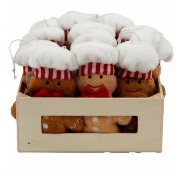 Soft fabric hanging Christmas decoration shaped like a gingerbread man baker, wearing a chef's hat and red bow, approximately 12 centimetres tall.
