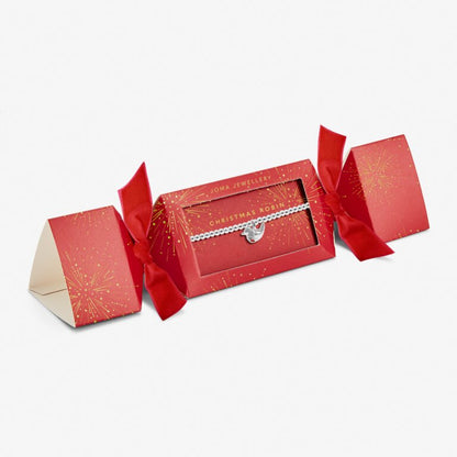 Joma silver-plated robin charm bracelet inside a red and gold cracker shaped gift box saying CHRISTMAS ROBIN