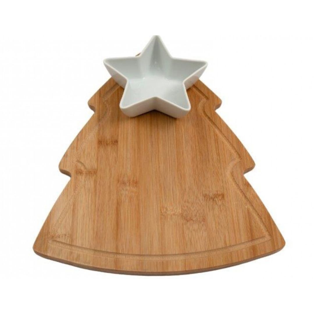 A festive wooden serving board shaped like a Christmas tree, with a small white ceramic star bowl and a cheese knife. 