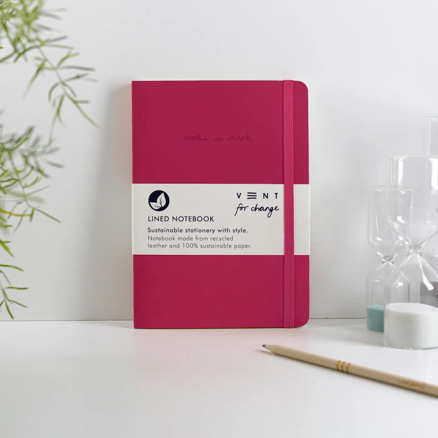 A5 recycled leather notebook with Make a Mark debossed cover, elastic closure, and sustainable lined pages - pink