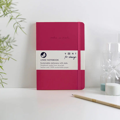 A5 recycled leather notebook with Make a Mark debossed cover, elastic closure, and sustainable lined pages - pink