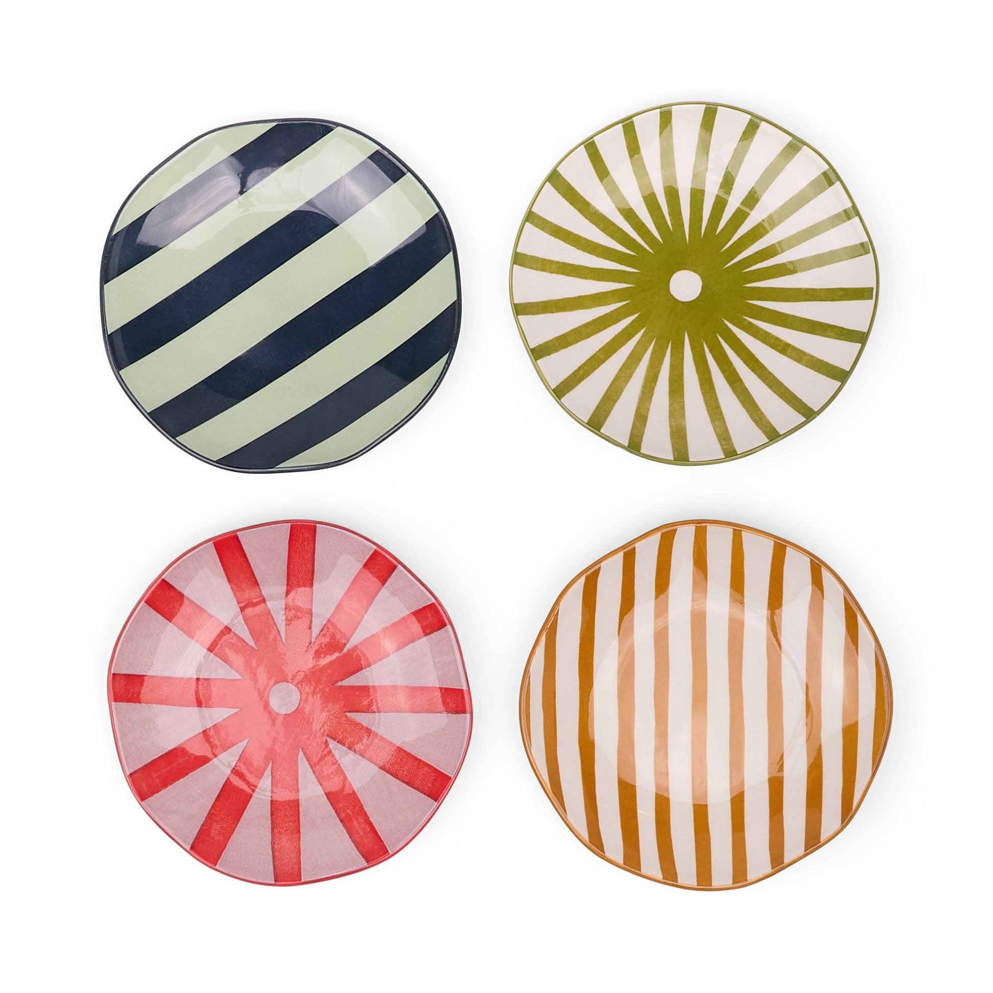 Set of four Marley appetizer plates with bold geometric patterns and vibrant colours, perfect for serving small bites and entertaining in style.