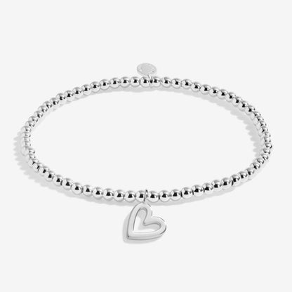 Silver-plated bracelet with heart shaped charm