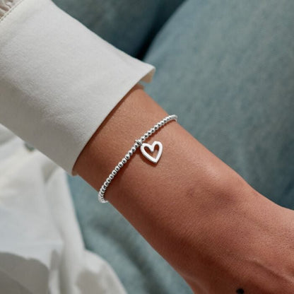 Silver-plated bracelet with heart shaped charm