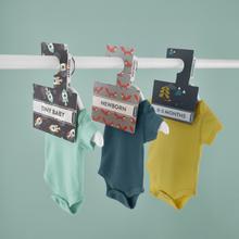 3 X wardrobe dividers featuring bright, fun Cosatto patterns like foxes, dinosaurs, and aliens, labelled with baby sizes.