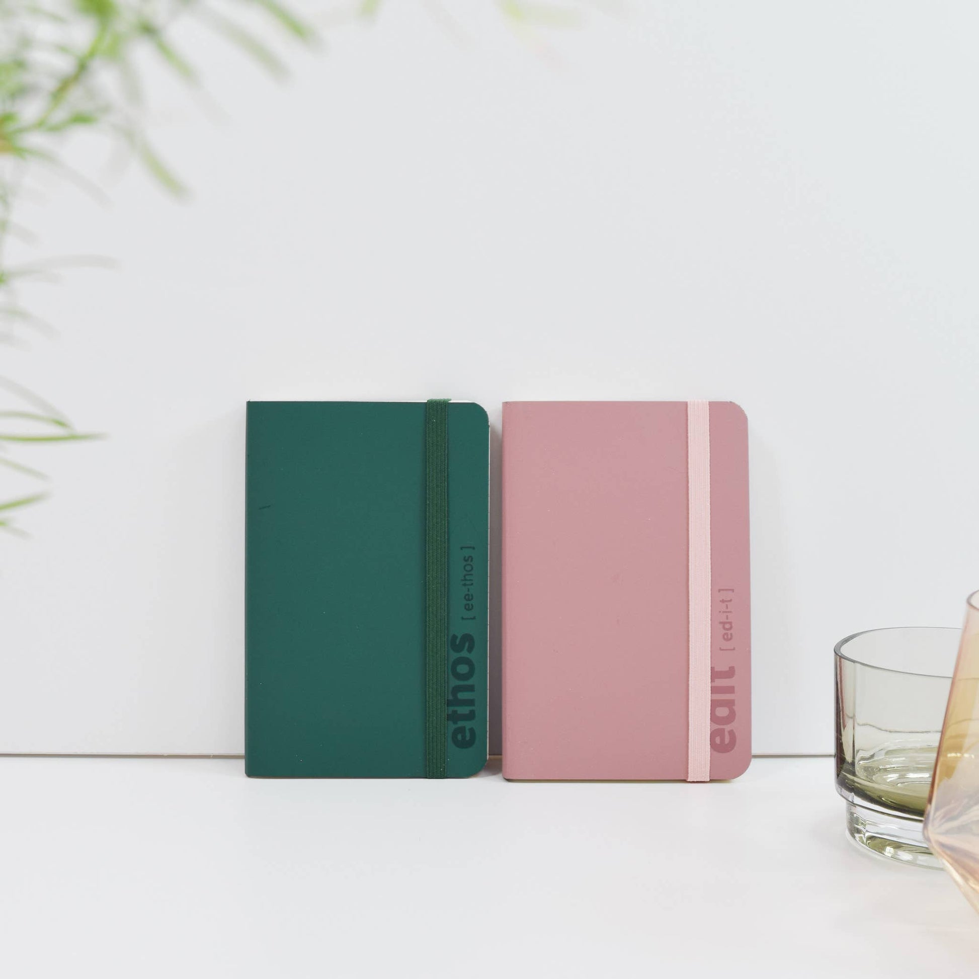 A6 recycled leather pocket notebook with elastic closure in green or pink