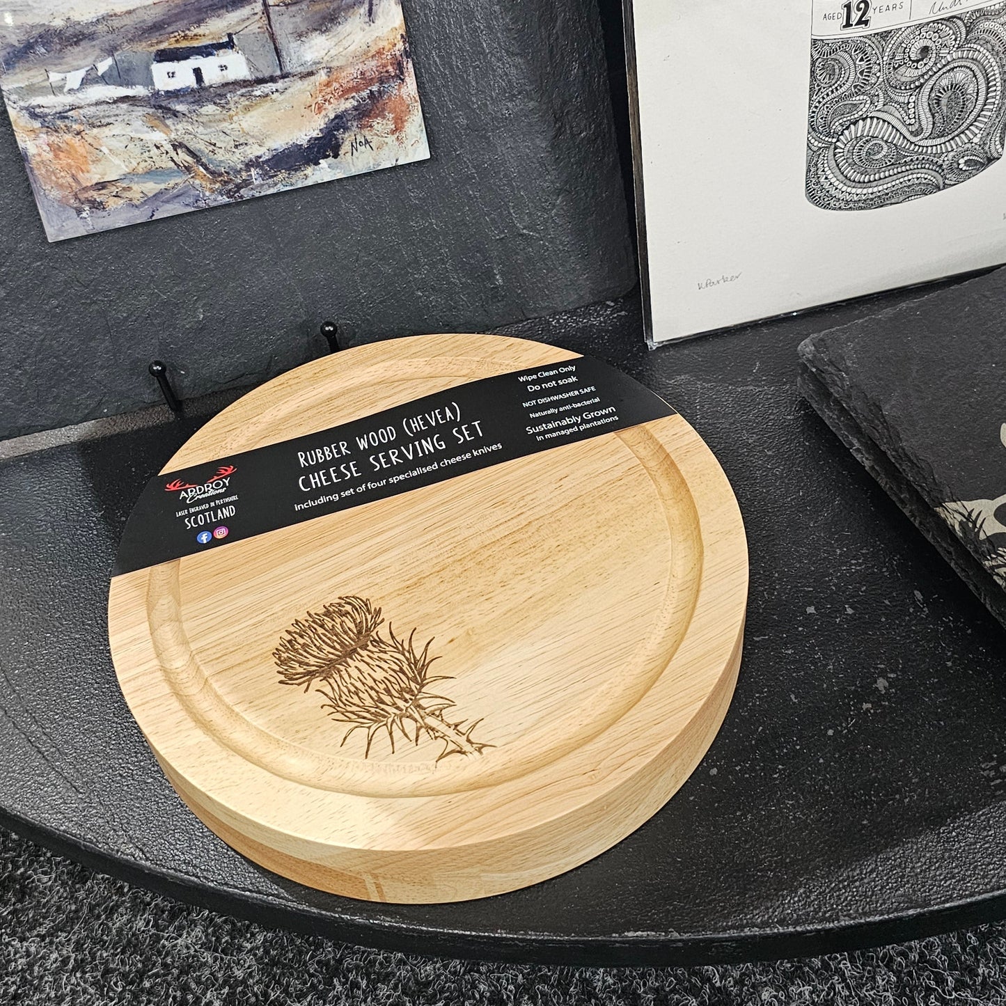 Round Hevea wood cheese serving set by Ardroy Creations with swivel opening and four specialised cheese knives