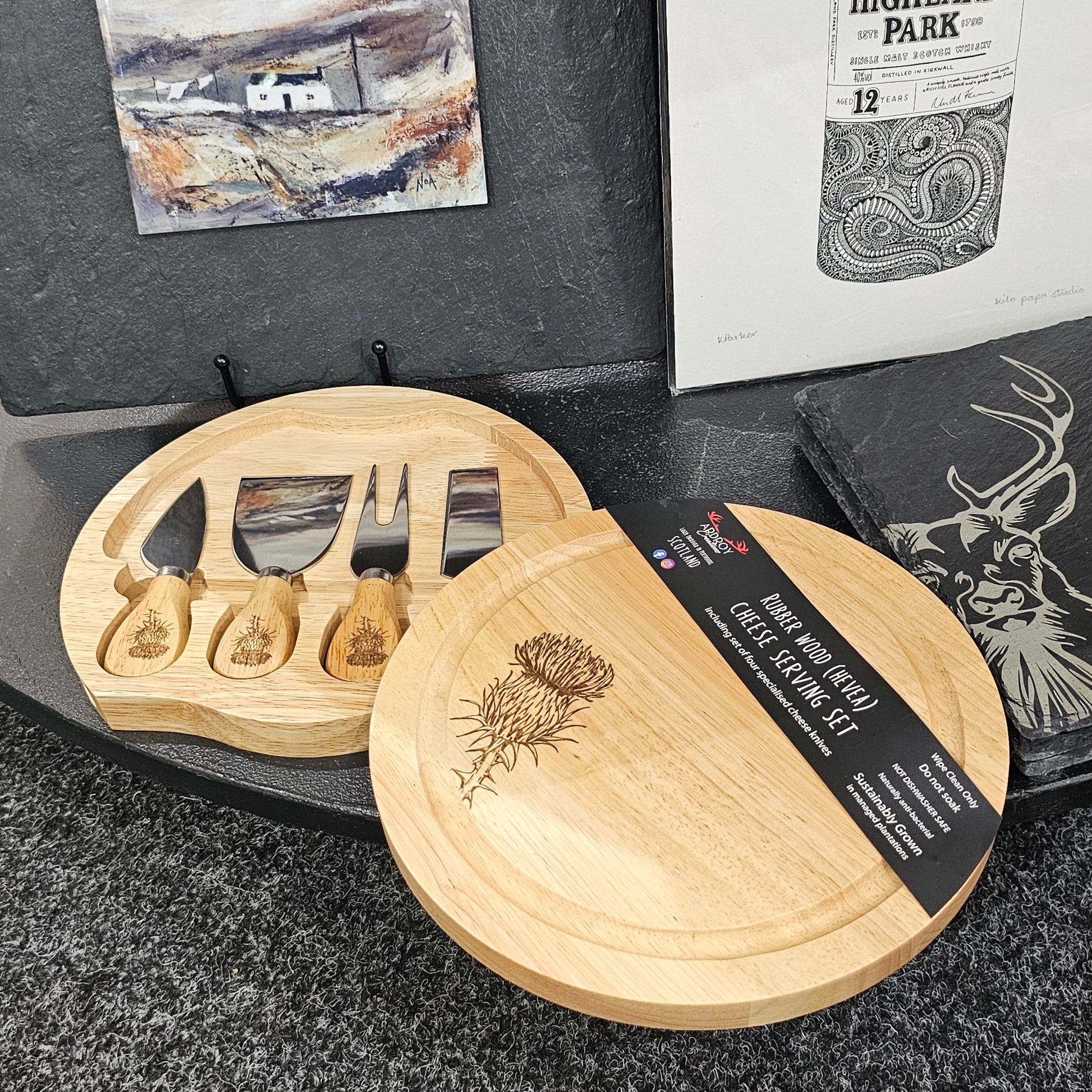 Round Hevea wood cheese serving set by Ardroy Creations with swivel opening and four specialised cheese knives