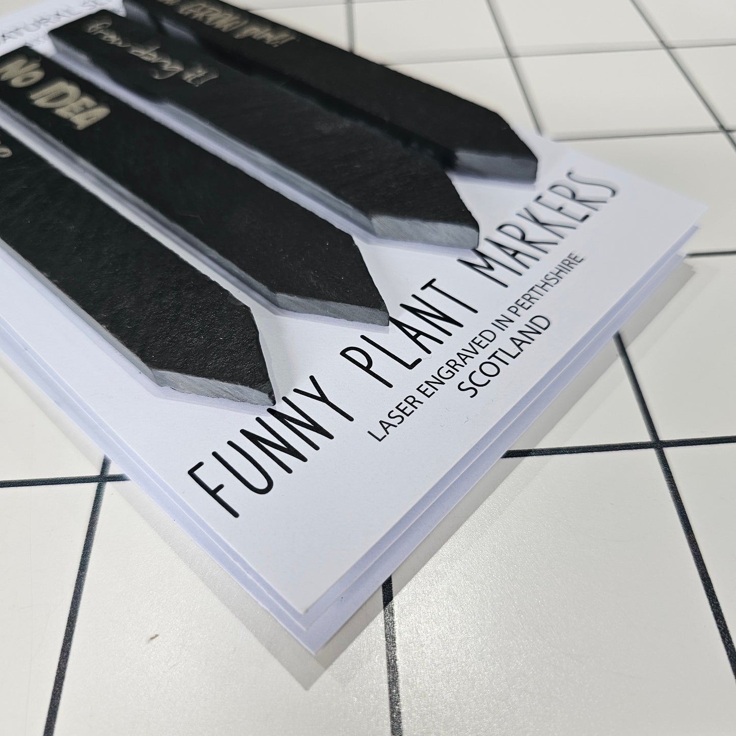 Set of four funny slate plant markers by Ardroy Creations featuring humorous gardening and plant slogans