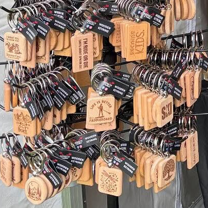 Solid beech wood keyrings by Ardroy Creations with Scottish designs, Scots words and wild swimming slogans