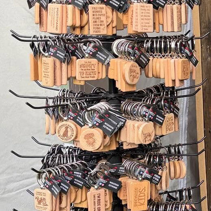 Solid beech wood keyrings by Ardroy Creations with Scottish designs, Scots words and wild swimming slogans