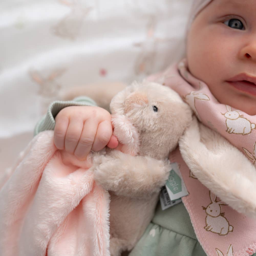 Super soft beige bunny comforter blanket made from recycled materials with a cuddly bunny character