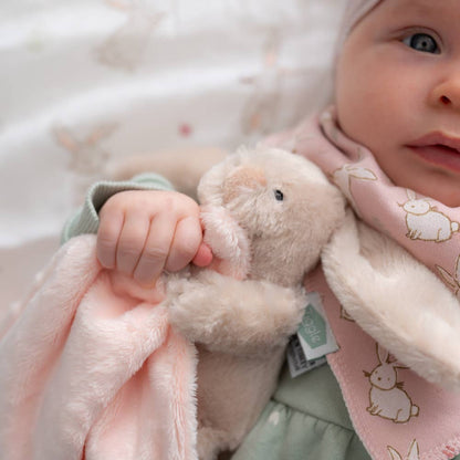 Super soft beige bunny comforter blanket made from recycled materials with a cuddly bunny character
