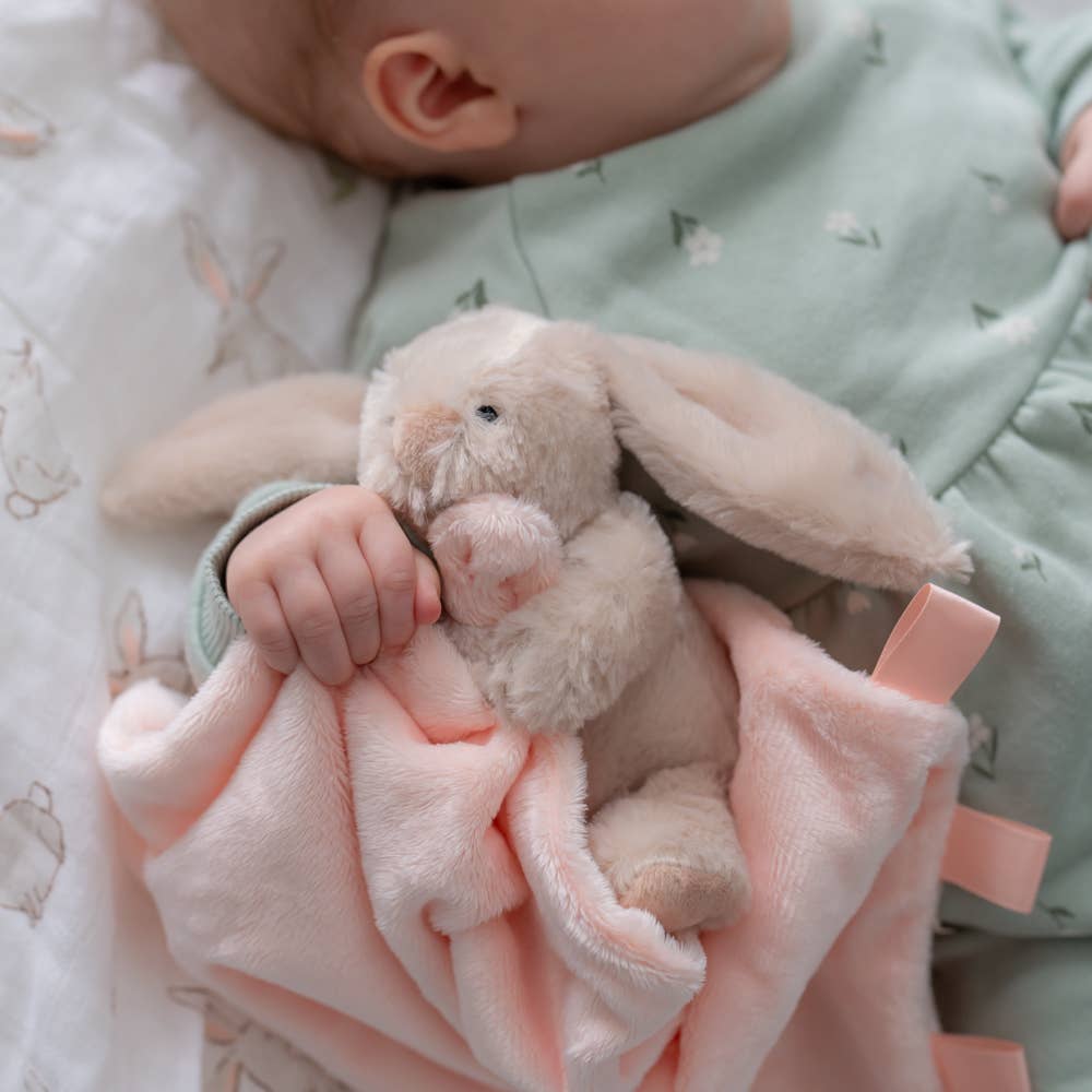 Super soft beige bunny comforter blanket made from recycled materials with a cuddly bunny character