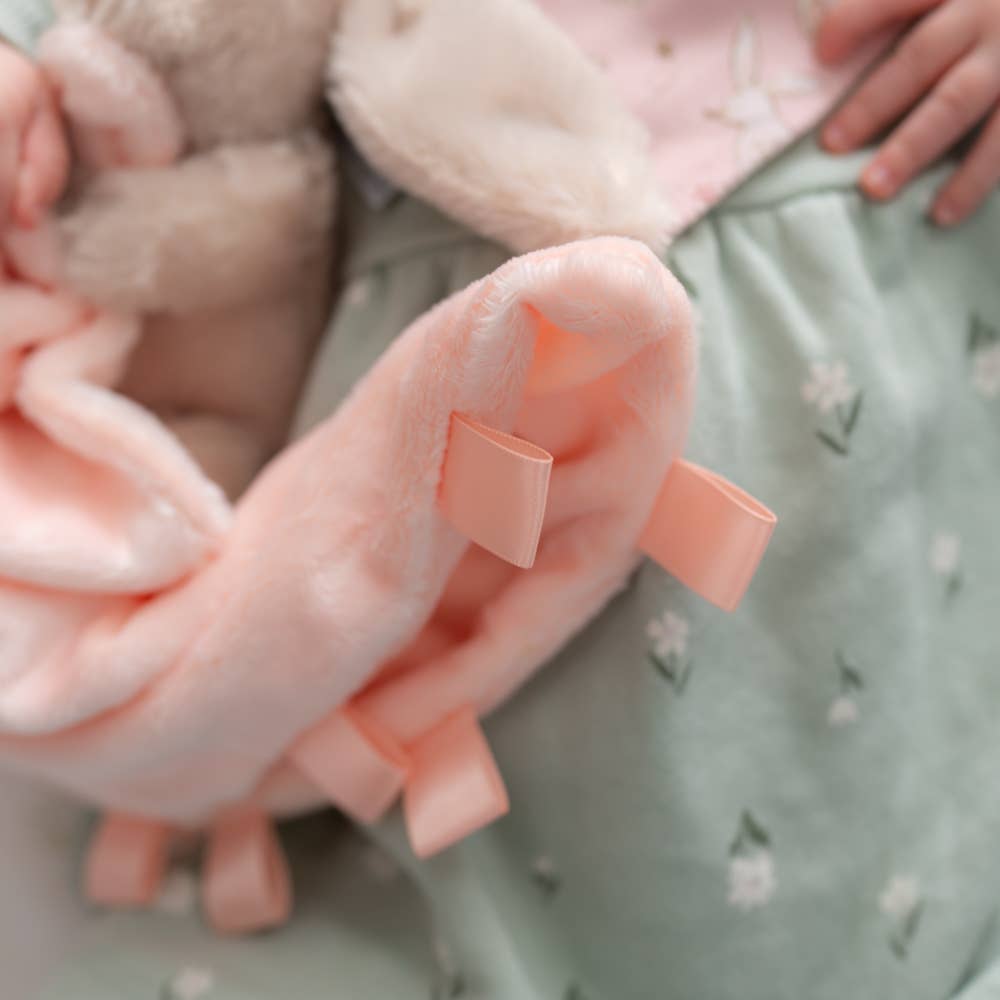 Super soft beige bunny comforter blanket made from recycled materials with a cuddly bunny character