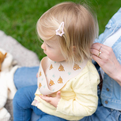 Catch It silicone baby bib by Ziggle with food pocket BPA free available in Bunnies design
