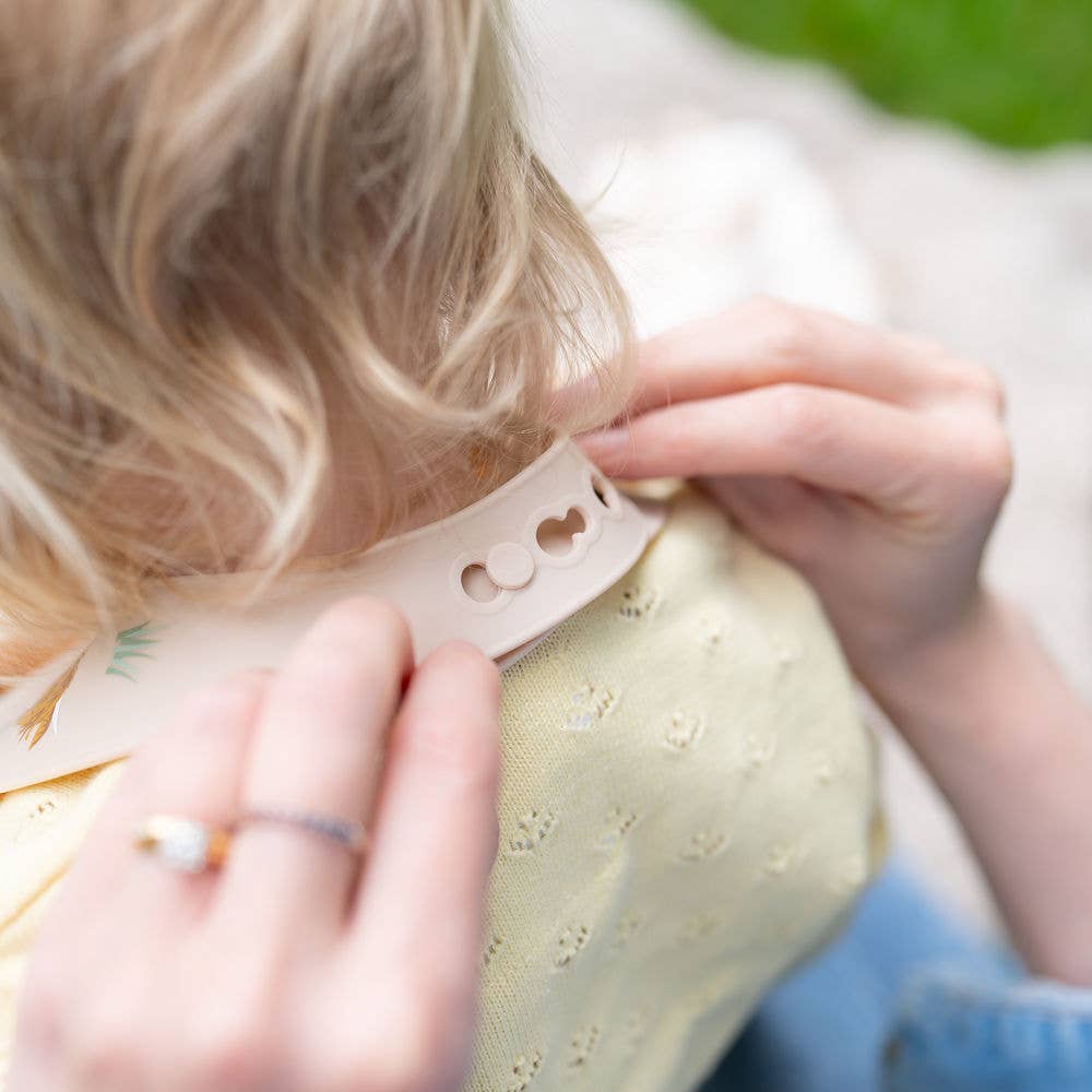 Catch It silicone baby bib by Ziggle with food pocket BPA free available in Bunnies design