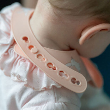 Catch It silicone baby bib by Ziggle with food pocket BPA free available in Bunnies design