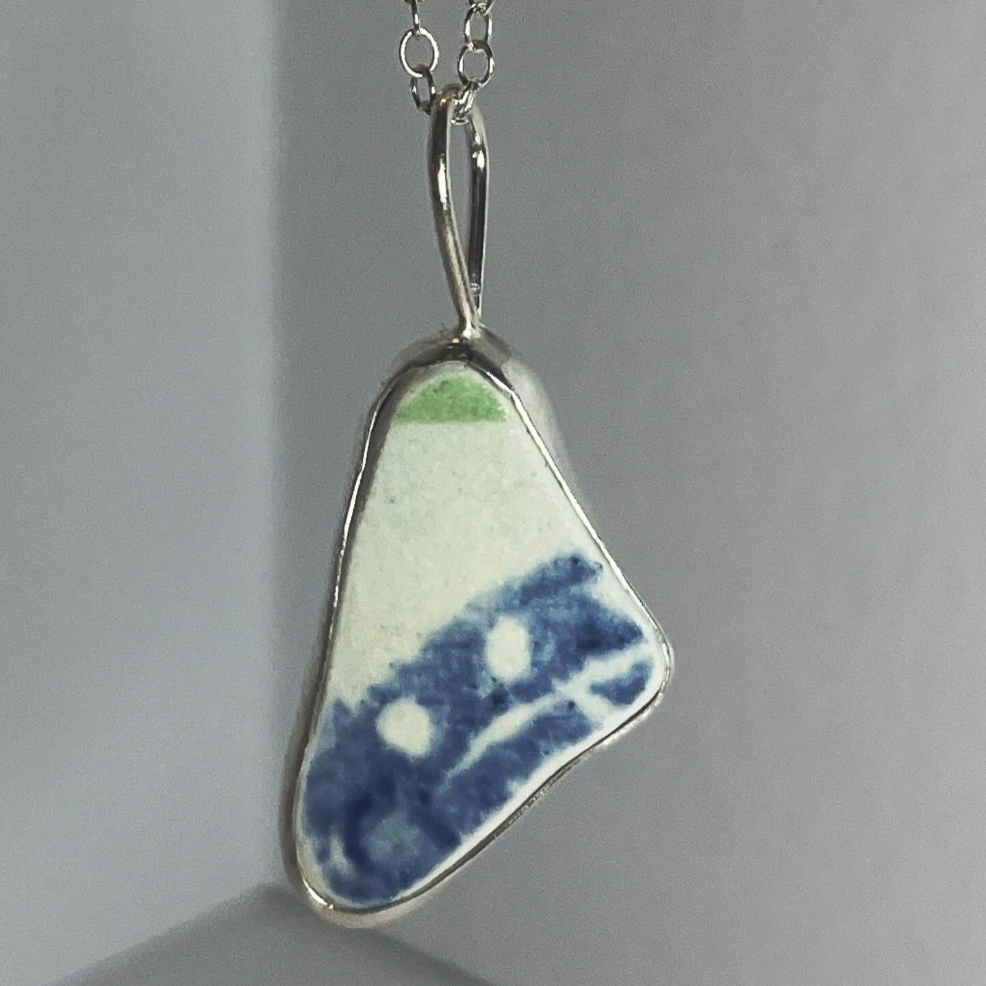 Sterling silver and blue/green/white sea pottery pendant necklace handmade in Dundee with triangle shape design
