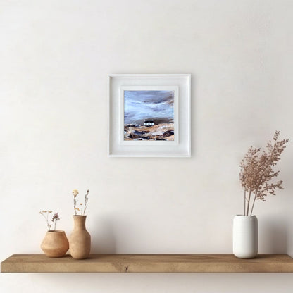 A ceramic tile print of a colourful painting titled 'Blustery Days', showing a small house nestled in the Scottish Highlands, available mounted on natural slate or framed.