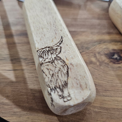 Scottish wooden bottle opener by Ardroy Creations with stainless steel hardware and Highland Coo design