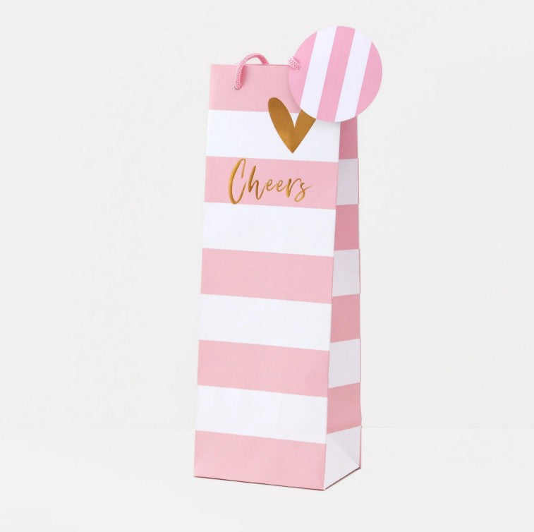 Pink and white striped Belly Button bottle gift bag with rope handles, tag and 'Cheers' gold text and heart