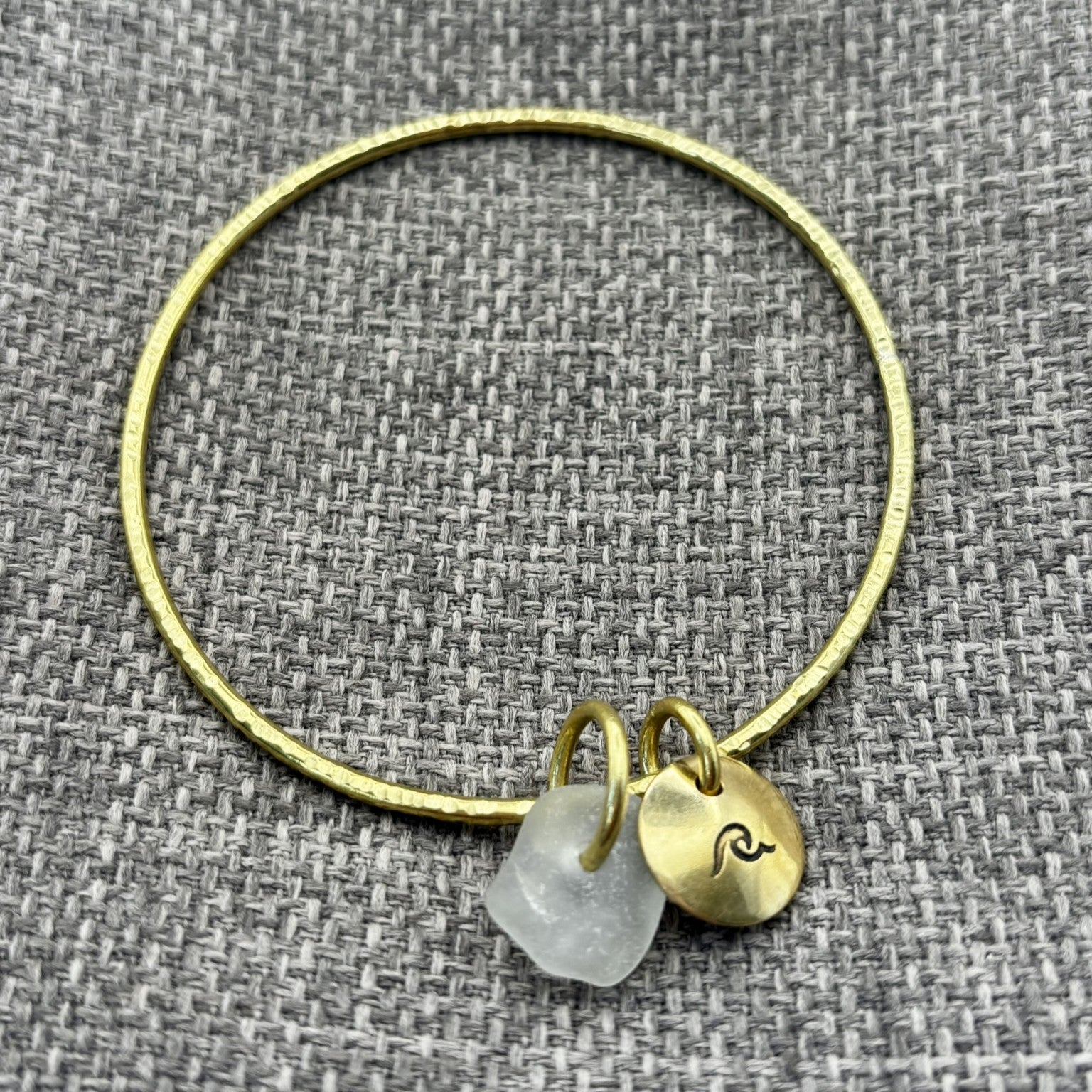 Handmade brass bangle by Rowan Berry Jewellery with genuine sea glass collected from beaches around Carnoustie
